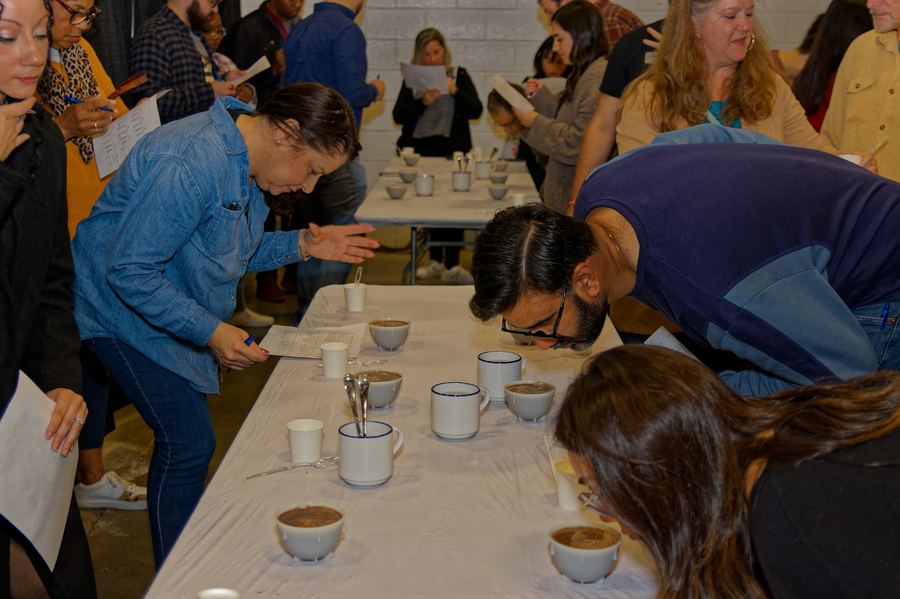 Guests taking part in a guided coffee cupping and tasting session.